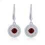 dancing garnet and white zircon double halo dangle earrings in rhodium over sterling silver