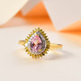 pink spinel yellow and white diamond double halo ring in 18k yellow gold over sterling silver shown in a lifestyle photo