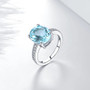 sky blue topaz and white zircon ring in rhodium over sterling silver
