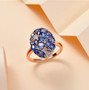 kyanite and white zircon celestial cluster ring in 18k rose gold over sterling silver shown in a lifestyle photo