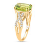 side view of peridot and diamond infinity shank ring in solid 10k yellow gold