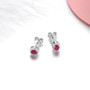 full view of emerald or ruby and white zircon halo stud earrings in rhodium over sterling silver