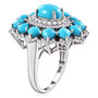 side view of turquoise tanzanite and moissanite halo ring in rhodium over sterling silver