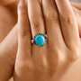 turquoise chrome diopside and amethyst ring in 18k yellow gold and rhodium over sterling silver worn on a hand