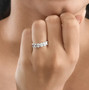 five stone princess cut cubic zirconia ring in rhodium over sterling silver worn on a hand