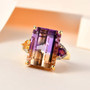 ametrine citrine amethyst and zircon ring in 18k yellow gold over sterling silver shown in a lifestyle photo