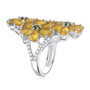 side view of tanzanian yellow opal chrome diopside and zircon flower cluster ring in rhodium over sterling silver