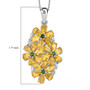 tanzanian yellow opal and chrome diopside flower cluster necklace in rhodium over sterling silver shown for size comparison