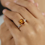 madeira citrine and white zircon ring in 18k yellow gold over sterling silver worn on a hand