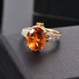 madeira citrine and white zircon ring in 18k yellow gold over sterling silver shown in a lifestyle photo