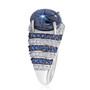 side view of blue star sapphire blue sapphire and moissanite ring in rhodium over sterling silver