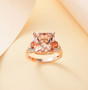 morganite padparadscha sapphire and diamond ring in solid 14k rose gold shown in a lifestyle photo