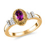purple garnet and yellow and white diamond ring in 18k yellow gold over sterling silver