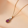 purple garnet and yellow and white diamond pendant necklace in 18k yellow gold over sterling silver shown in a lifestyle photo