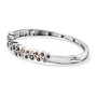 side view of bezel set multi color tourmaline and white zircon bangle bracelet in 18k yellow gold over sterling silver