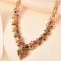 multi color tourmaline statement necklace in 18k yellow gold over sterling silver shown in a lifestyle photo
