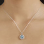 blue zircon blue sapphire and moissanite pendant necklace in rhodium over sterling silver worn around the neck