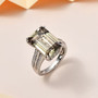 turkizite and diamond ring in solid 950 platinum shown in a lifestyle photo