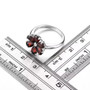 garnet and white zircon flower cluster ring in rhodium over sterling silver shown for size comparison
