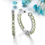front view of peridot cabochon hoop earrings in rhodium over sterling silver