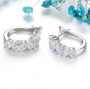 side view of ethiopian opal and white zircon hoop earrings in rhodium over sterling silver