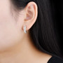 ethiopian opal and white zircon hoop earrings in rhodium over sterling silver worn on the ear