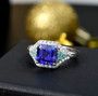 tanzanite paraiba tourmaline and diamond ring in 950 platinum shown in a lifestyle photo