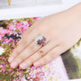 garnet and white zircon ring in rhodium over sterling silver