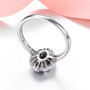 back view of garnet and white zircon halo ring in rhodium over sterling silver