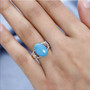 sleeping beauty turquoise rubellite and diamond ring in solid 10k yellow gold worn on a hand