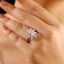 rainbow moonstone moissanite and pink sapphire ring in rhodium over sterling silver worn on a hand
