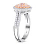 side view of pink and white diamond round cluster ring in two-tone 14k rose and white gold