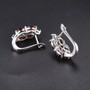 full view of garnet earrings in rhodium over sterling silver