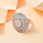 close up of rainbow moonstone and moissanite statement ring in rhodium over sterling silver