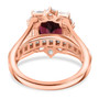 full view of rhodolite garnet and moissanite halo bridge ring in 18k rose gold over sterling silver