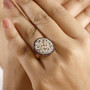 rainbow moonstone brown and white zircon ring in 18k yellow gold over sterling silver worn on a hand