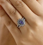 tanzanite blue sapphire and diamond ring in rhodium over sterling silver worn on a hand