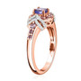 side view of tanzanite pink sapphire and zircon ring in 18k rose gold over sterling silver