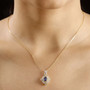 tanzanite yellow sapphire and moissanite pendant necklace in 18k yellow gold over sterling silver worn around the neck