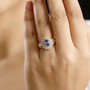 tanzanite yellow sapphire and diamond ring in 18k yellow gold over sterling silver worn on a hand