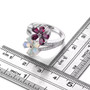 rhodolite garnet opal and zircon flower bypass ring in rhodium over sterling silver shown for size comparison
