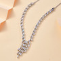 rainbow moonstone lariat necklace in rhodium over sterling silver shown in a lifestyle photo
