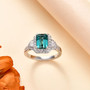 indicolite tourmaline and diamond ring in 950 platinum shown in a lifestyle photo