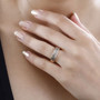 square cut champagne diamond band ring in 14k rose gold worn on a hand