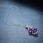 full view of amethyst and white zircon flower cluster pendant necklace in rhodium over sterling silver