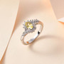 heliodor and white zircon bypass ring in rhodium over sterling silver shown in a lifestyle photo