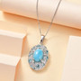 larimar blue apatite and moissanite pendant necklace in rhodium over sterling shown in a lifestyle photo