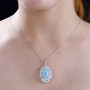 larimar blue apatite and moissanite pendant necklace in rhodium over sterling worn around the neck