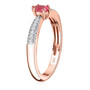 side view of mahenge pink spinel and moissanite dainty solitaire ring in 18k rose gold over sterling silver