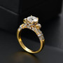 side view of moissanite ring in 18k yellow gold over sterling silver